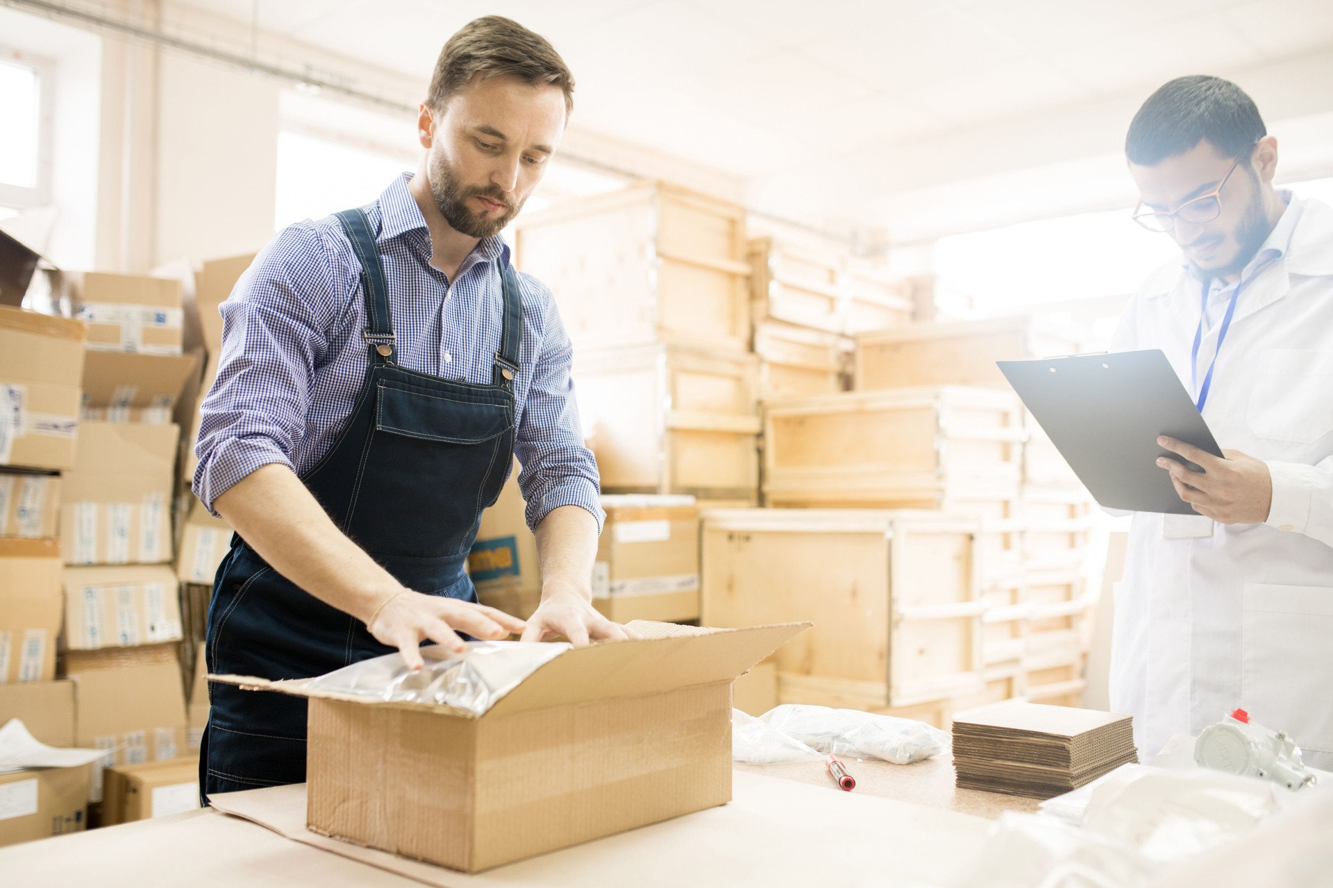 Teamwork at Warehouse of Modern Factory